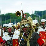 Full Roman Century on the march with infantrymen. horn-blower, standard bearer, centuruion (sergeant major) and equipment. Image shot 2010. Exact date unknown.